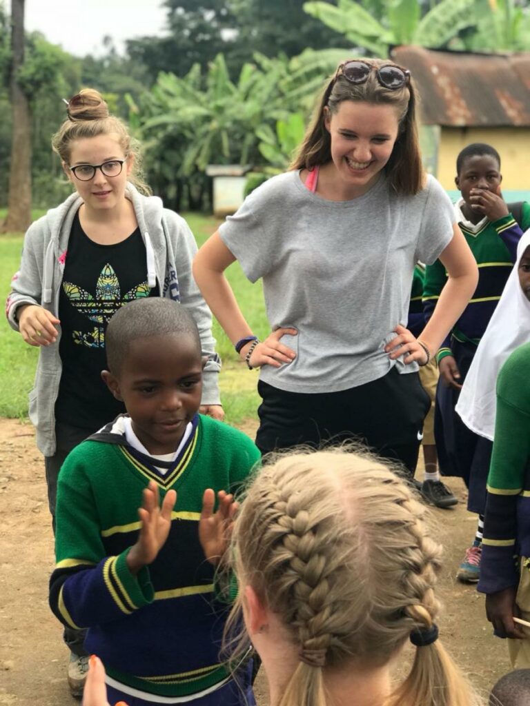 Playing with a group of children from a Tanzanian primary school